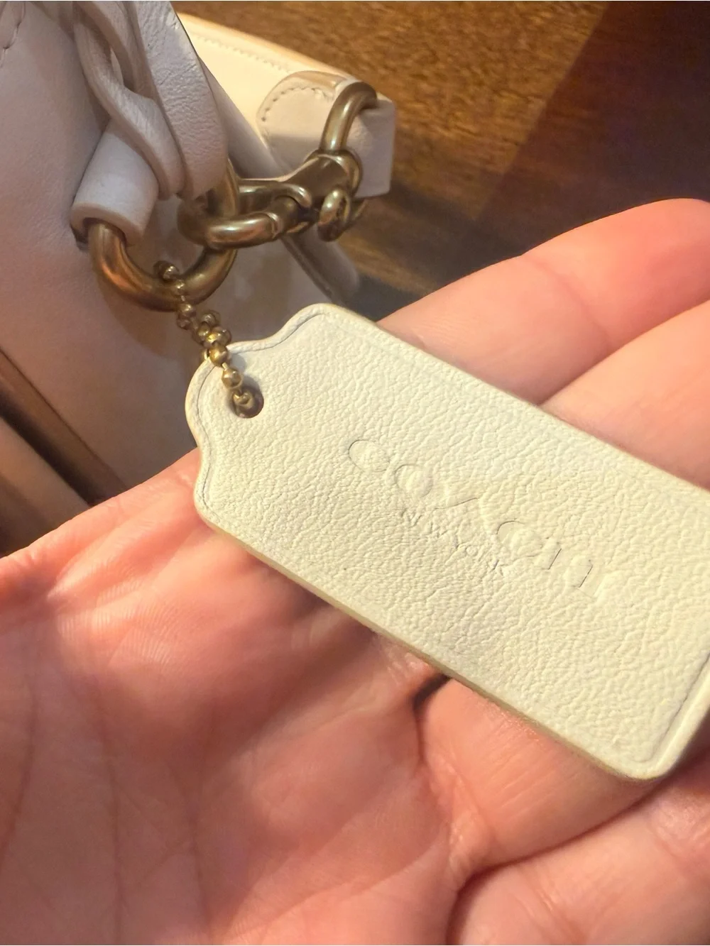Coach elegant cream